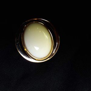 Gold and cream brooch